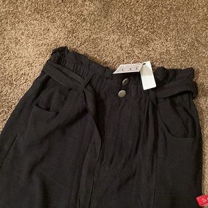 PAPERBAG HIGH WAISTED BLACK PANTS. Size small. Stretch at the waist. NWT